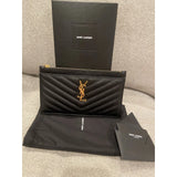 Saint Laurent Cassandre leather clutch bag